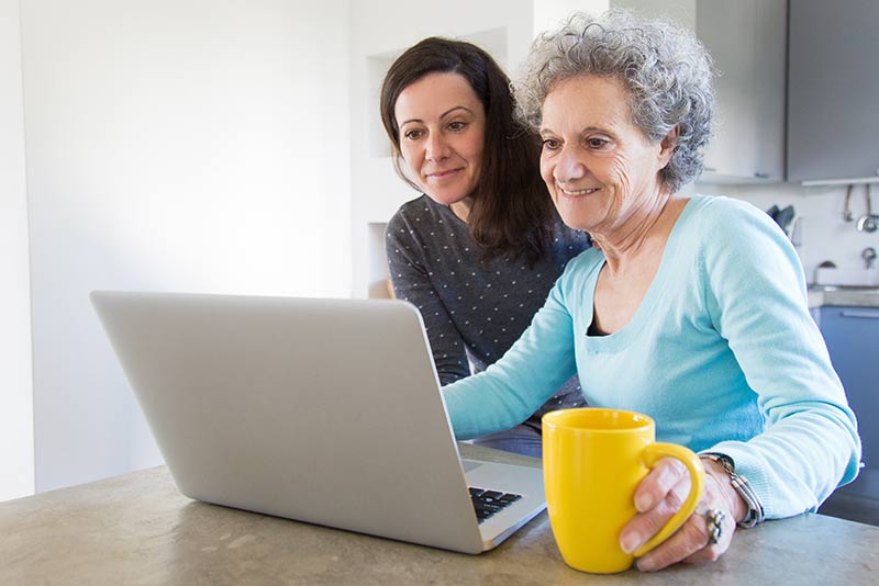 elderly woman on laptop